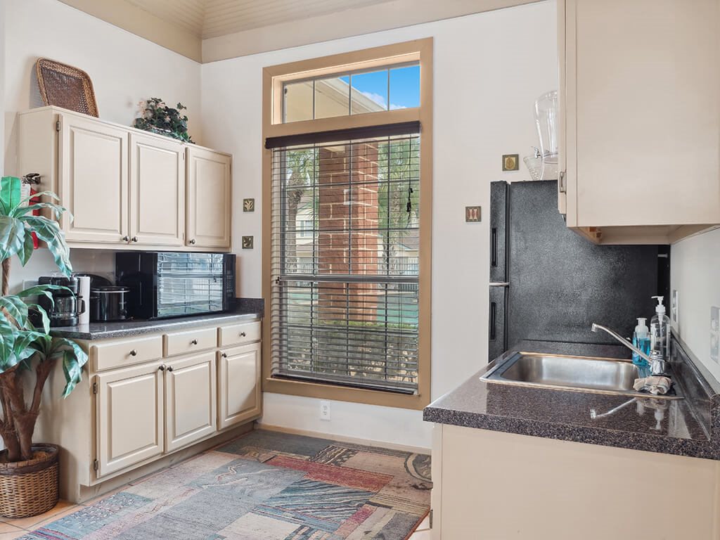 Community room kitchen at Tidwell Estates in Houston TX